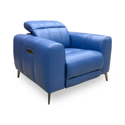 Angle view demonstrating the armchair's contemporary linear proportions, clean side tailoring, and wall-away clearance reclining architecture.
