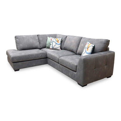Side perspective look at the sofa frame profile, demonstrating its balanced seating depth, supportive track arm height, and clean upholstery alignment.
