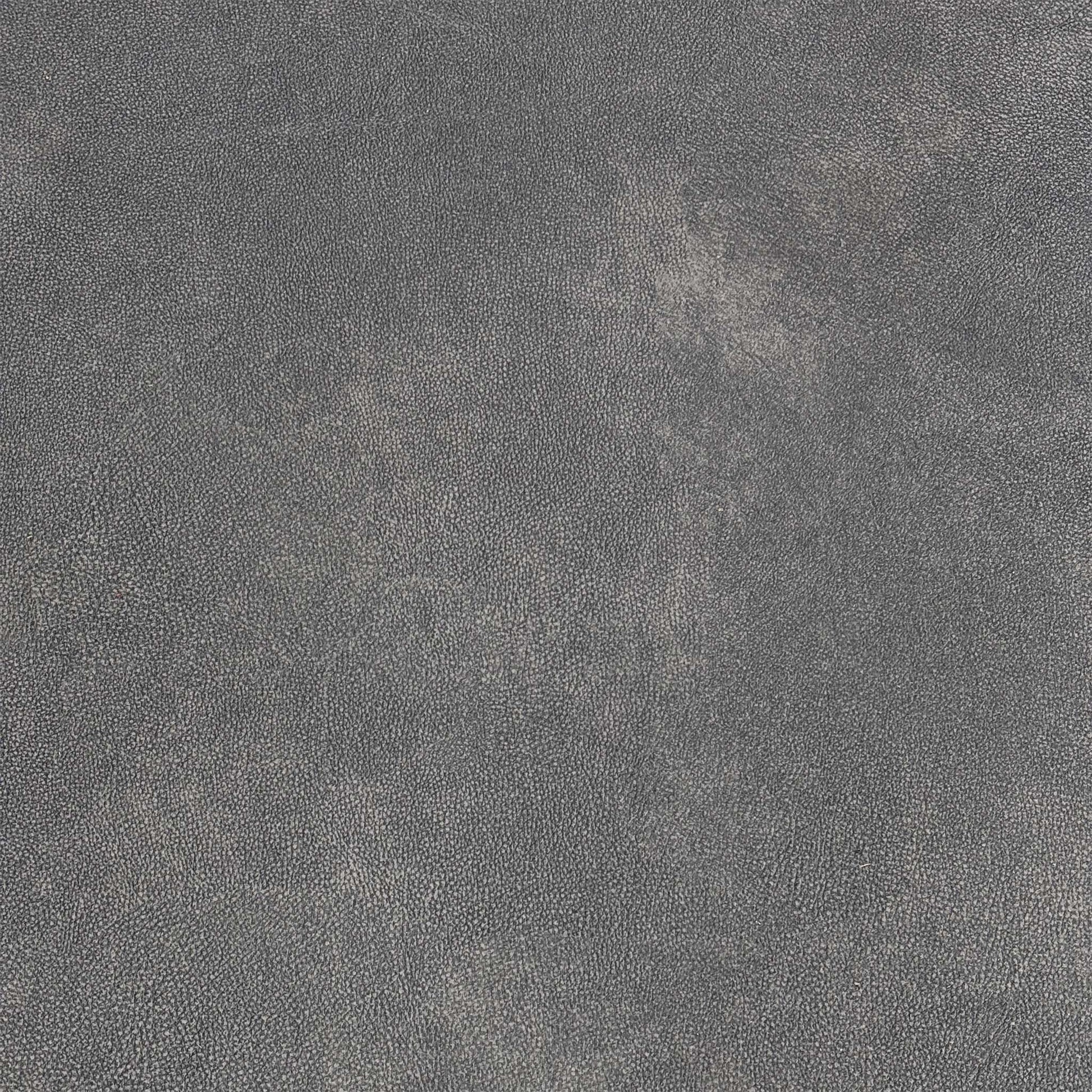 High-definition close-up macro view of the mocha grey fabric upholstery, detailing the durable multi-tonal woven yarn and premium structural thread density.