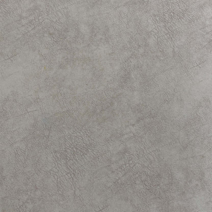 Close-up look at the corners of the footstool, highlighting the neat fabric folds and high-quality craftsmanship of the tailored seams.