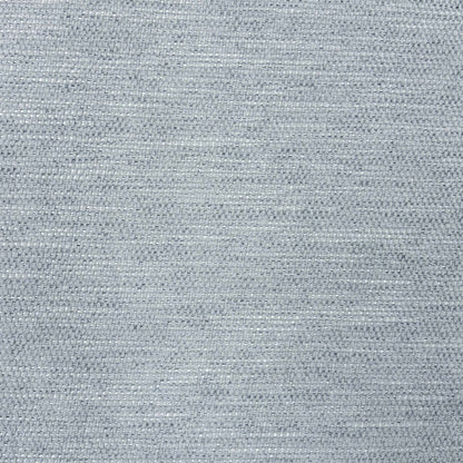 Close-up of the grey woven fabric used on the Raul swivel dining chairs