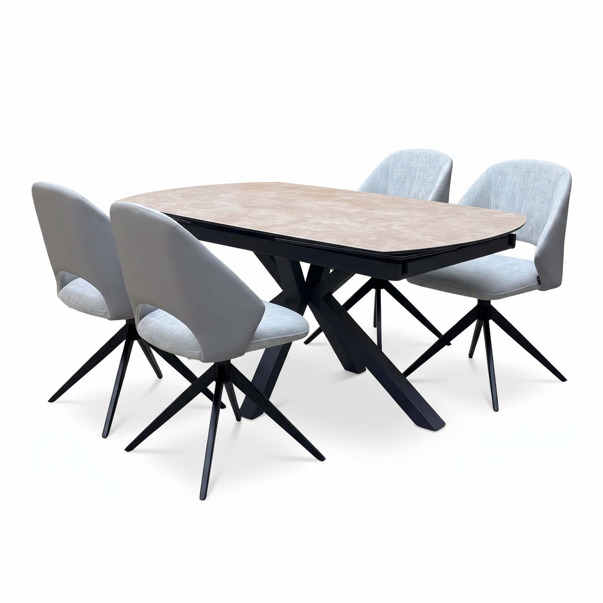 Raul argile ceramic dining table set from the left, grey swivel chairs facing the table