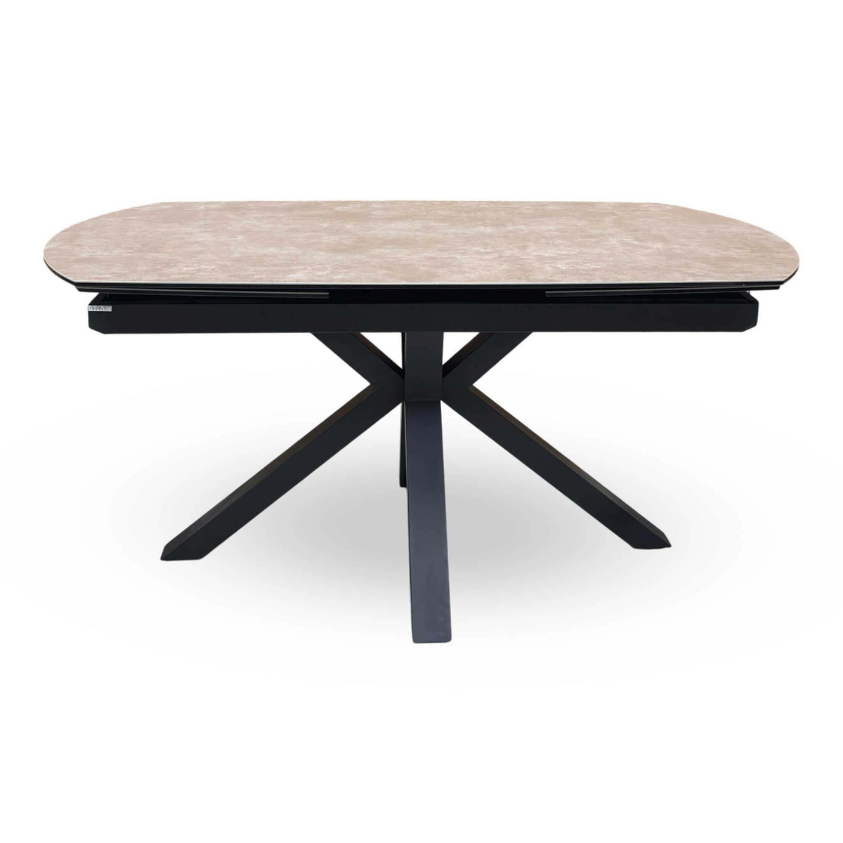 Front view of the Raul argile ceramic top dining table with rounded ends and black cross legs