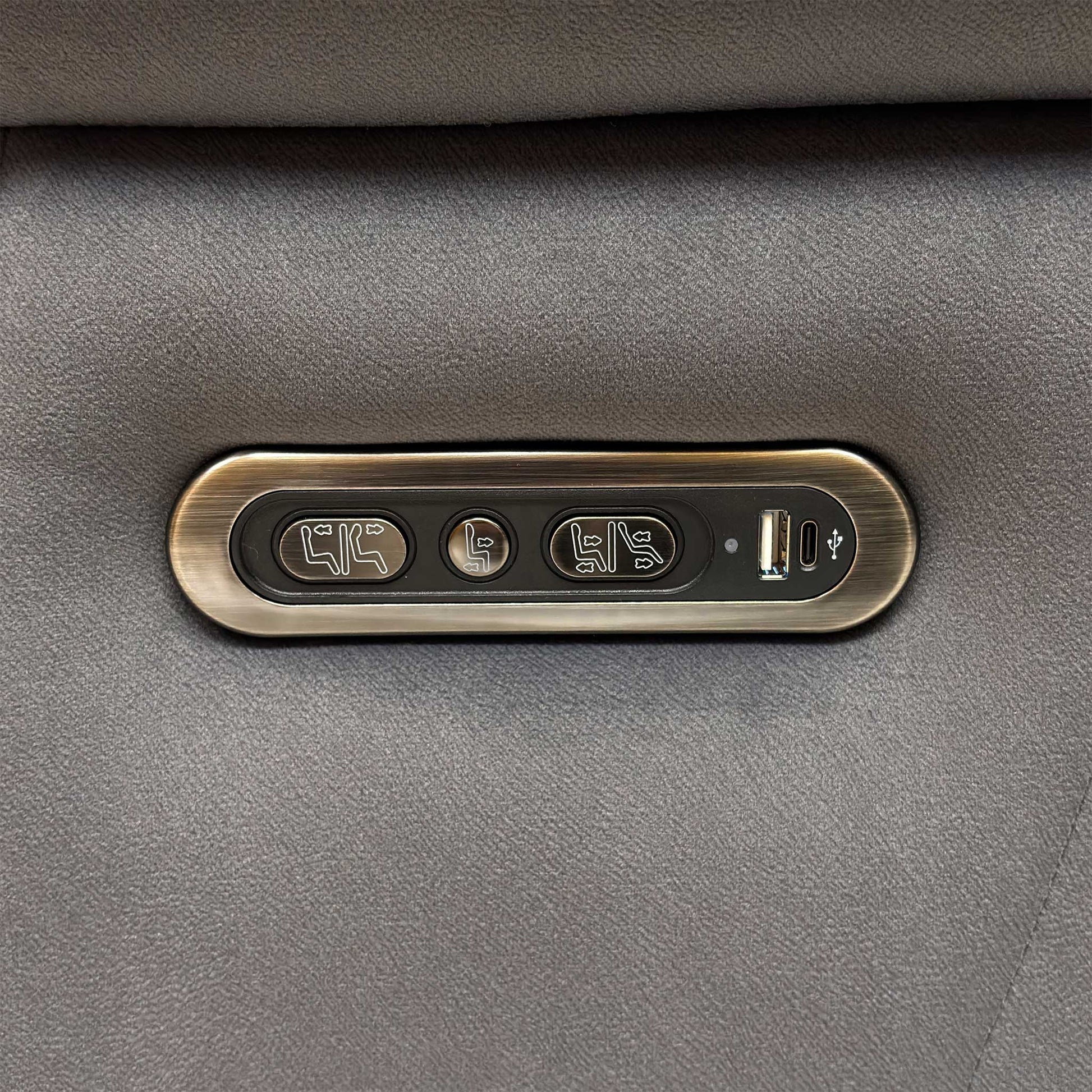 Close up view of the Genius 43460 Bella Iron Grey fabric upholstery, emphasizing the dense woven textile texture, durable seams, and the integrated side control buttons with USB port.