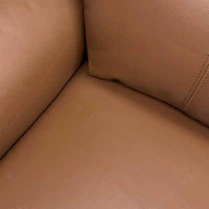 Close up view of the Bobby 3-seater sofa, displaying the fully upholstered tan brown leather back panels and neat power cable layout for flexible placement.