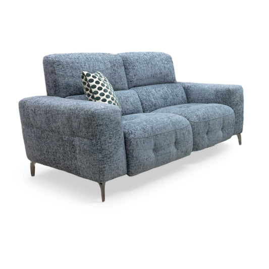 Full view of the New York 2-seater power recliner sofa in silverish blue fabric, showcasing its modern compact silhouette, deeply padded back cushions, and sleek track arms.