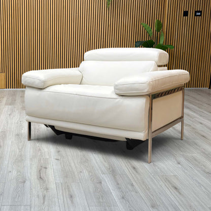 Lifestyle view Nicoletti Theron Torello white leather power recliner chair in fully reclined position. Image displays the smoothly extended electronic footrest and tilted backrest, highlighting the dual-motor specialized comfort motion and seamless mechanism transition.