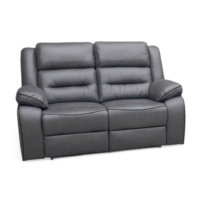 Side view of vegas charcoal grey home cinema power reclining sofa shown in a darkened room. Highlights the vibrant ambient blue LED under-glow light strip running along the base, creating an authentic movie theater atmosphere at home.