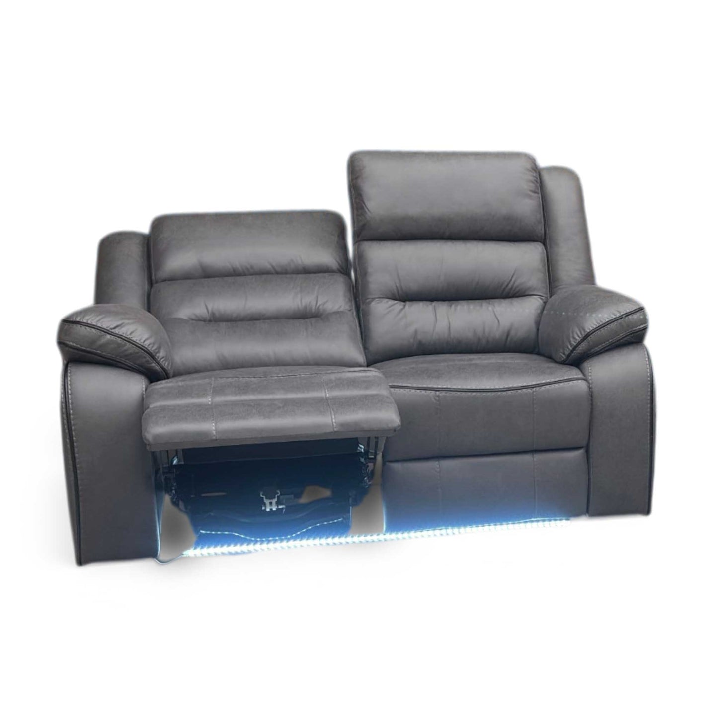 Side view of vegas charcoal grey home cinema power reclining sofa shown in a darkened room. Highlights the vibrant ambient blue LED under-glow light strip running along the base, creating an authentic movie theater atmosphere at home.