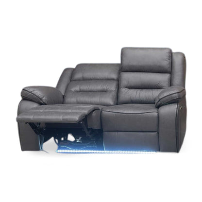 Front view Vegas charcoal grey microfibre 2-seater power recliner cinema sofa styled in a modern living room setting. The contemporary fabric couch is arranged with home entertainment decor to demonstrate upscale media room interior styling.