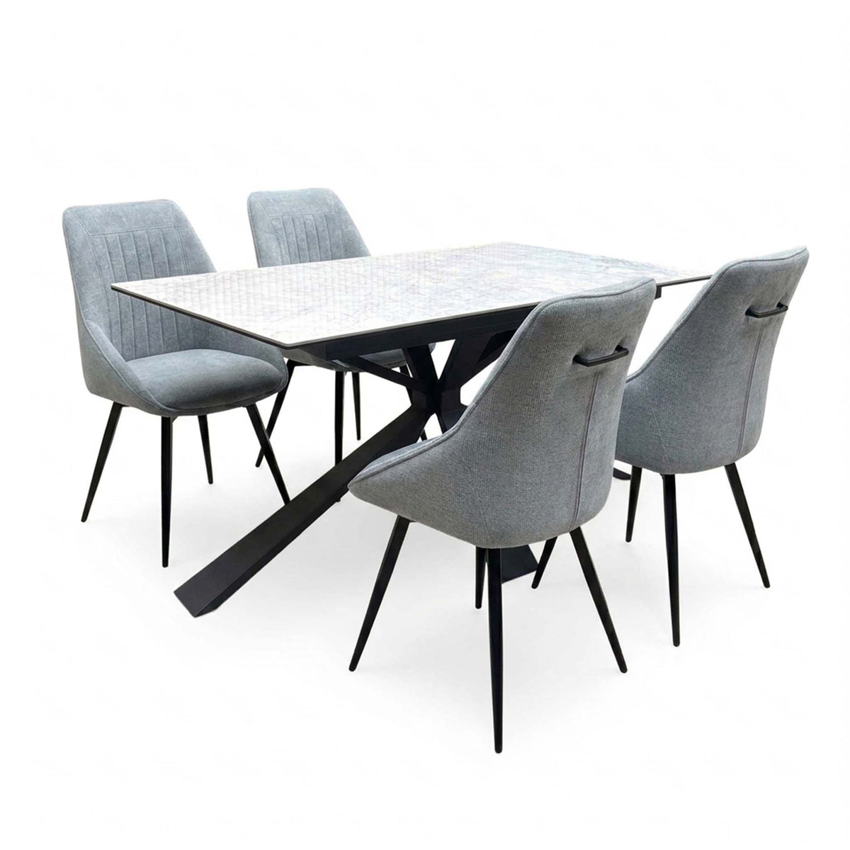 Crete ceramic top dining table and four dark grey swivel chairs from the right, two chairs pulled out