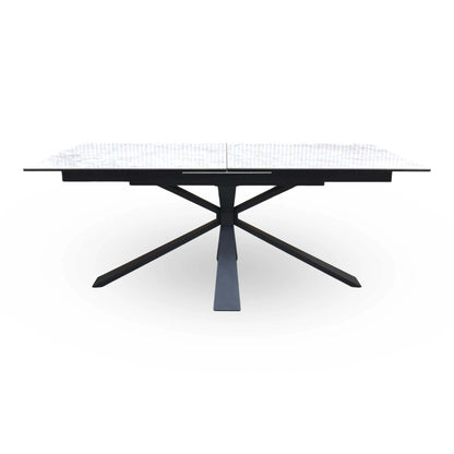 Front view of the Crete ceramic top 180cm extending dining table showing the centre join and black metal legs
