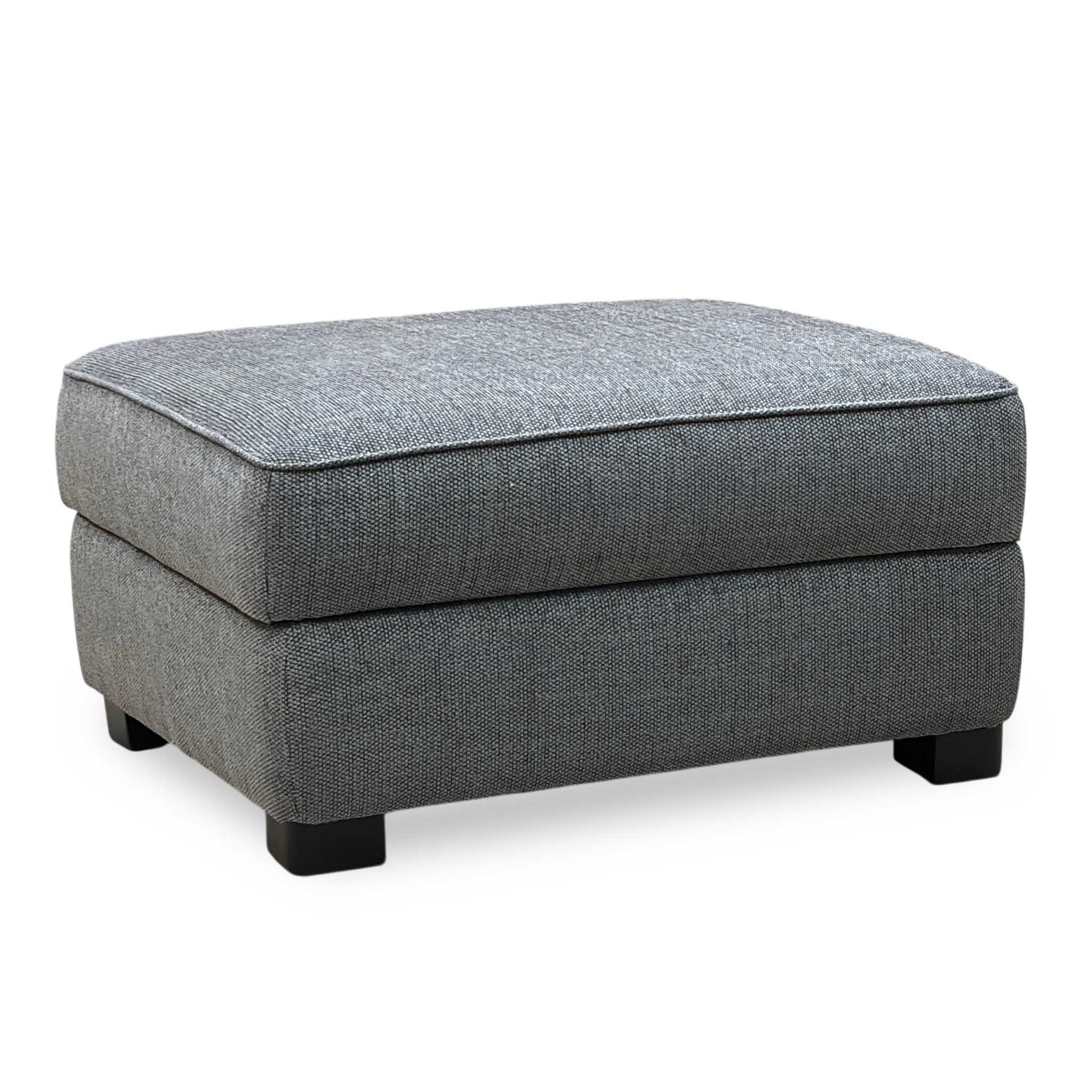 Gray upholstered ottoman on a white background
