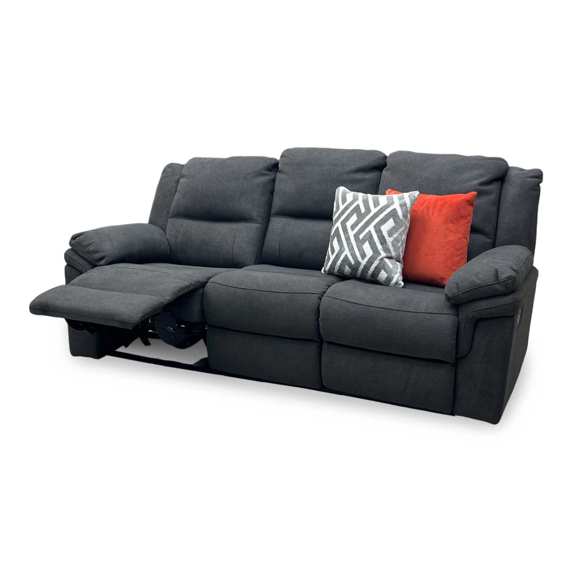 Side perspective profile view of the sofa, displaying the generous cushioning depth, high supportive backrest contours, and reclining clearance.