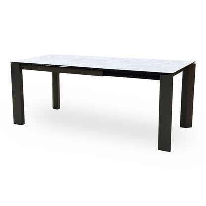 Side view of a table leg junction, highlighting the flawless alignment, premium hardware fittings, and the high-durability connection to the main metal perimeter chassis.