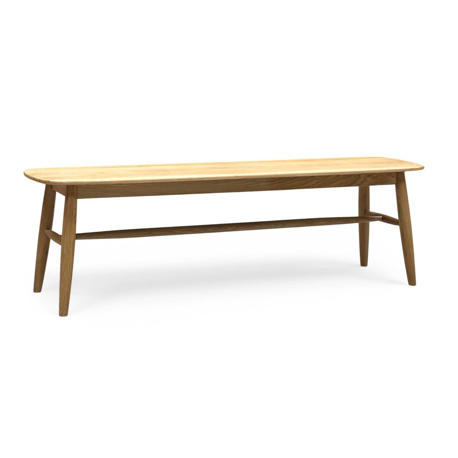 Wooden dining table on a white background