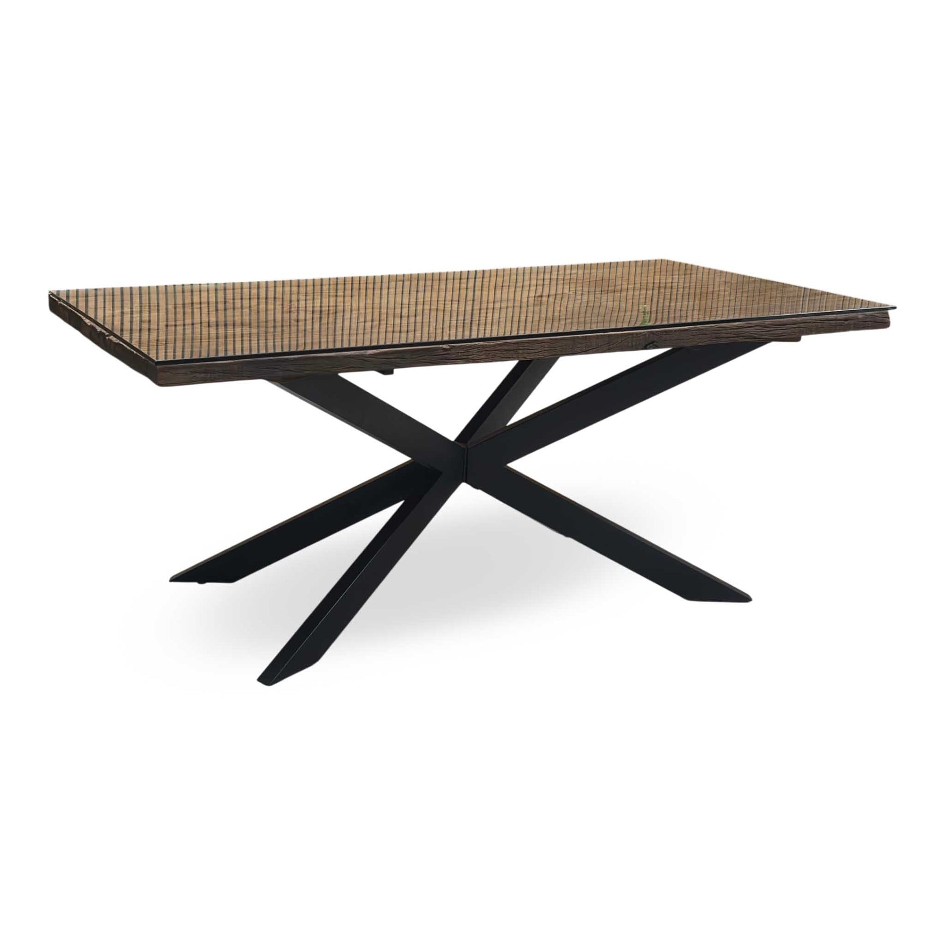 Rectangular table with woven top and black metal legs on a white background