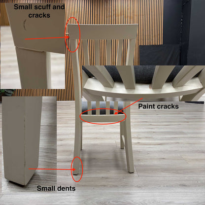 Angle view down at the seat and backrest junction, displaying the flawless edge finishing, tight tolerances, and pristine tailored construction lines.Damage on chair legs &amp; upholstery.