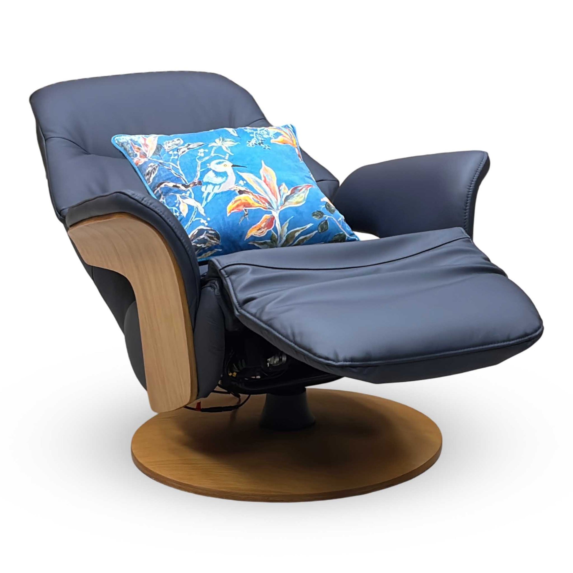 Blue recliner chair with a wooden base and floral pillow on a white background