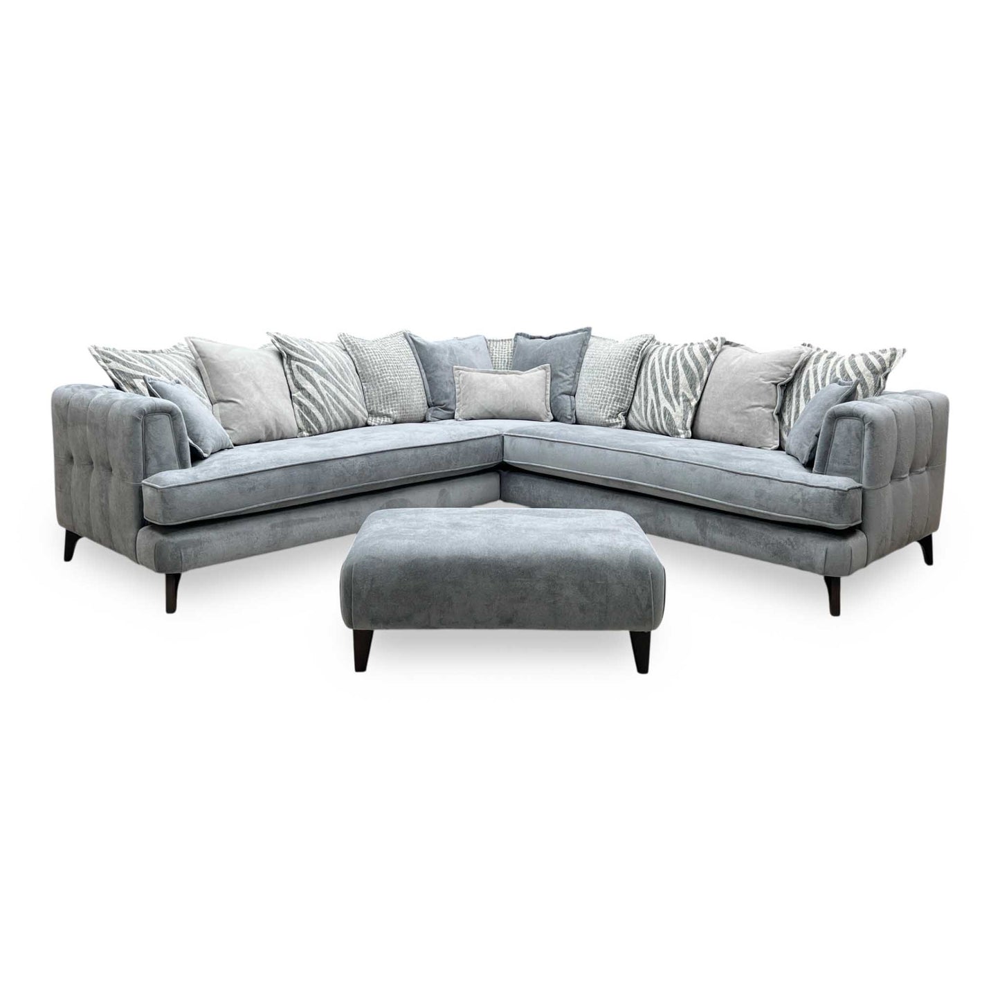 Front-facing view of the Farrah corner sofa suite, highlighting the expansive seating layout, plush scatter back cushion arrangement, and clean symmetrical design.