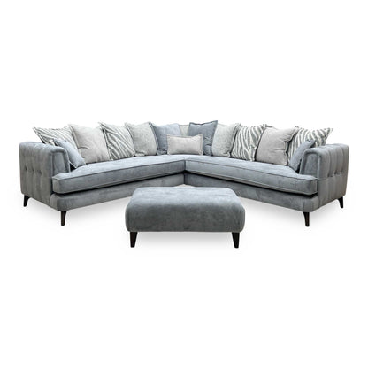Front-facing view of the Farrah corner sofa suite, highlighting the expansive seating layout, plush scatter back cushion arrangement, and clean symmetrical design.