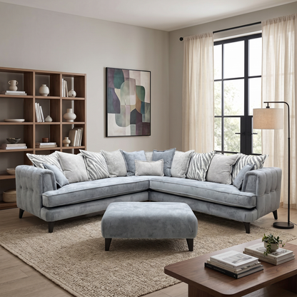 Styled modern family living room lifestyle layout featuring the Farrah grey and silver scatter back corner sofa and footstool arranged as an inviting central centerpiece.