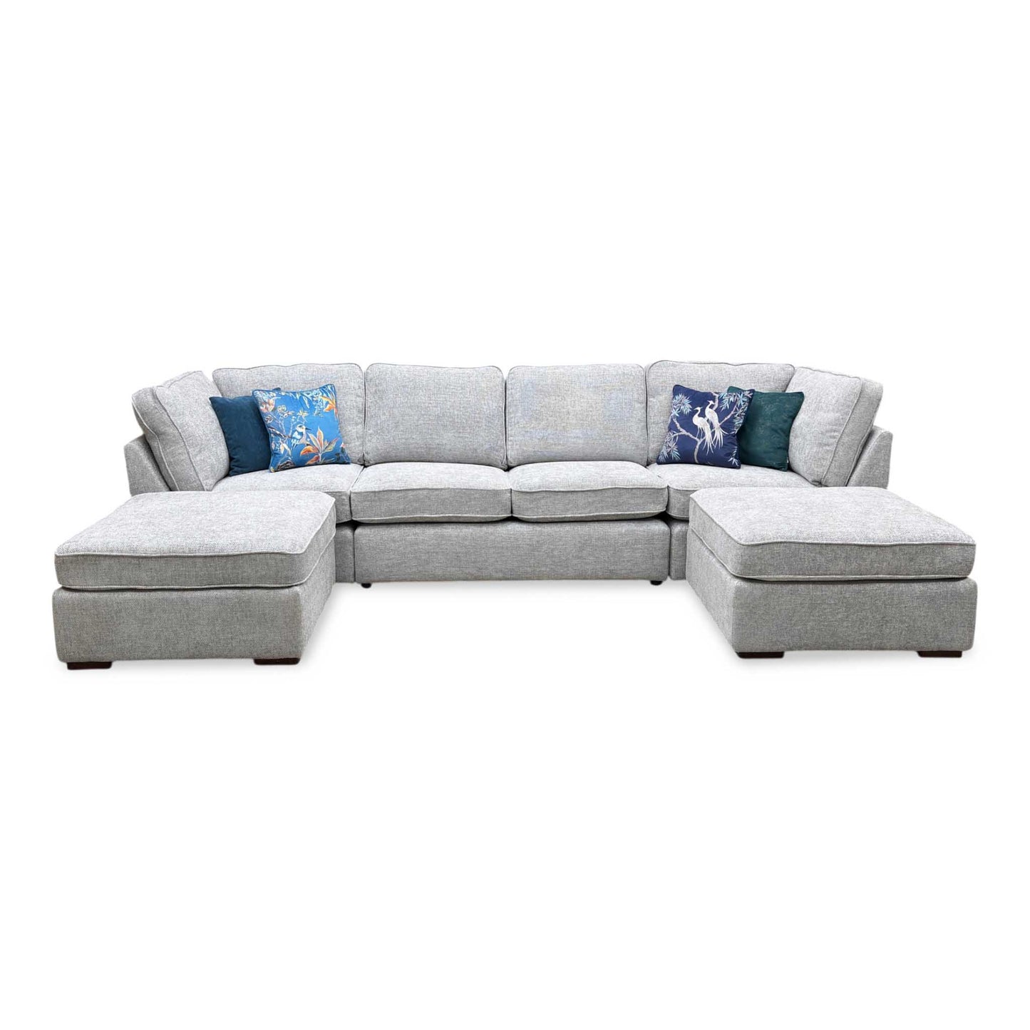 Front-facing view of the sprawling U-shaped corner sofa suite, highlighting the massive dual-chaise symmetrical layout, deep multi-cushion seating configurations, and clean lines.