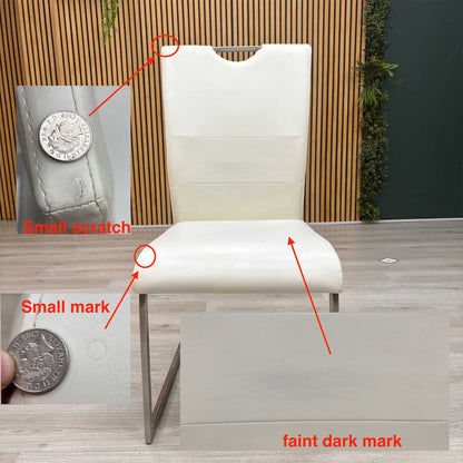 Front-facing view of the two Bianco white faux leather dining chairs arranged side-by-side, highlighting their clean vertical stitching patterns, contoured padded seats, and elegant symmetry.Small defect on the chair.