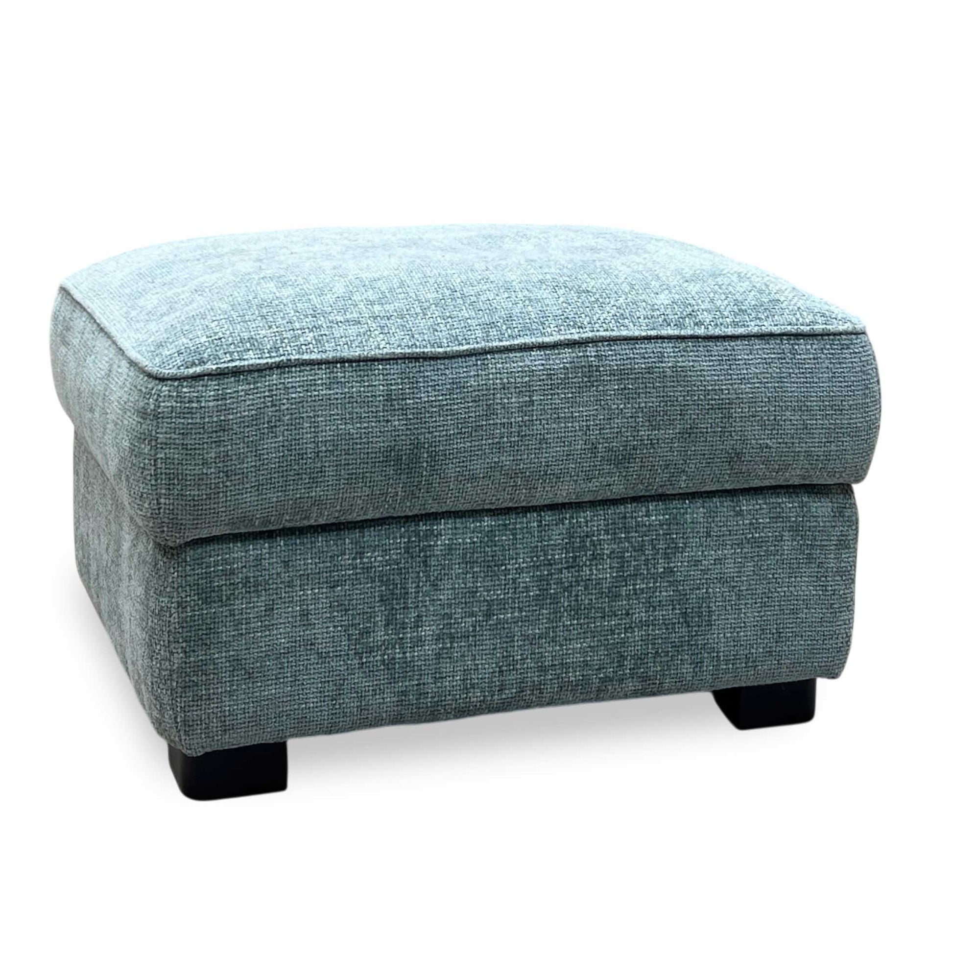 Side perspective profile view of the footstool frame, demonstrating the clean linear transitions, low-profile structure, and neat perimeter corner stitching.