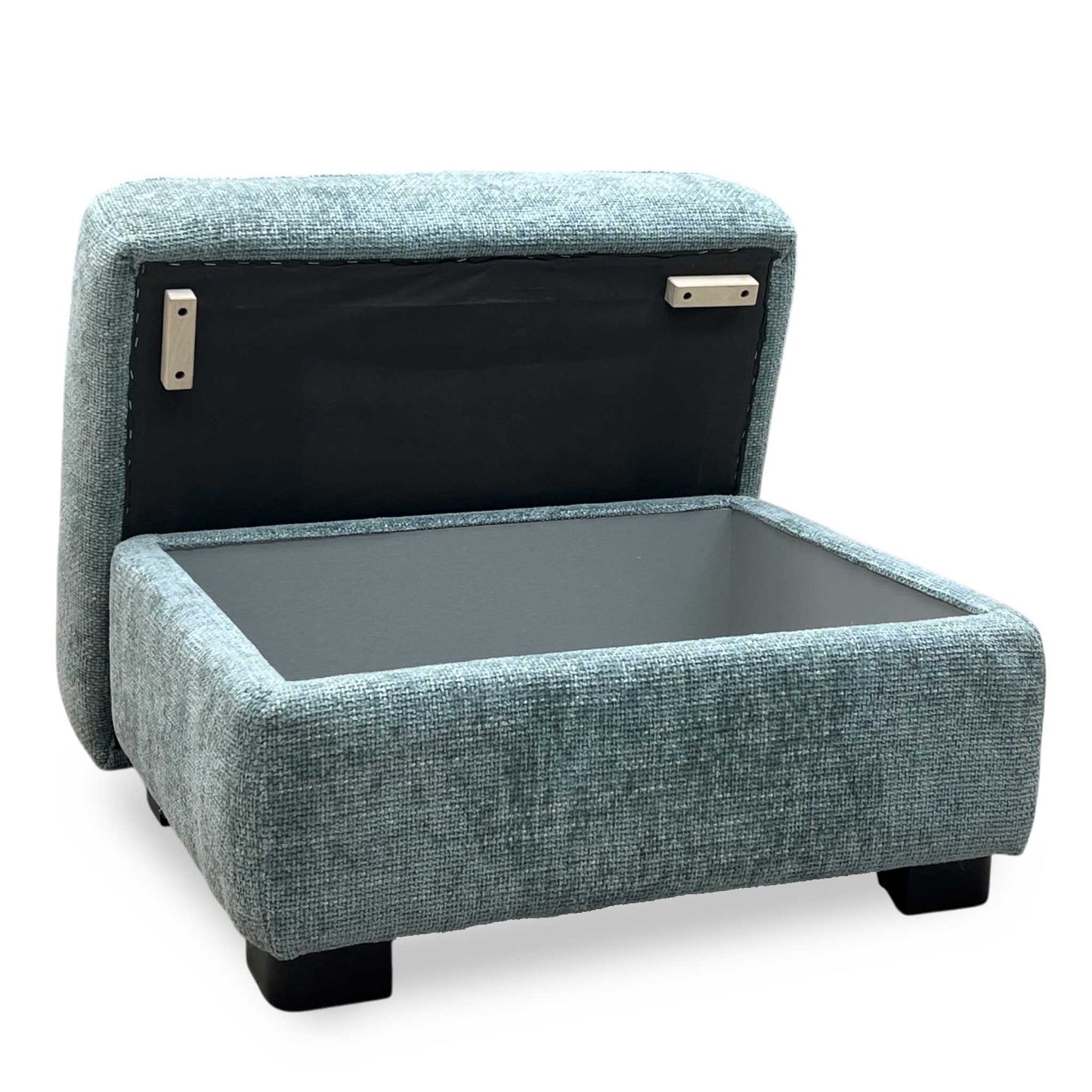 Side perspective profile view of the footstool frame, demonstrating the clean linear transitions, low-profile structure, and neat perimeter corner stitching.