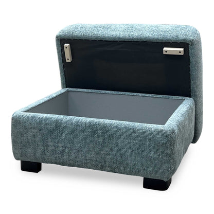Angle view under the base chassis, highlighting the robust structural timber frame construction, protective internal lining, and discreet, elegant support feet.