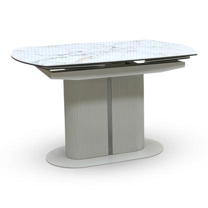 Under-table view of the Avorio swivel extending table's mechanical engineering. Highlights the smooth-glide rotating steel ring track and heavy-duty pivot bearings that allow the ceramic top to twist and expand effortlessly.