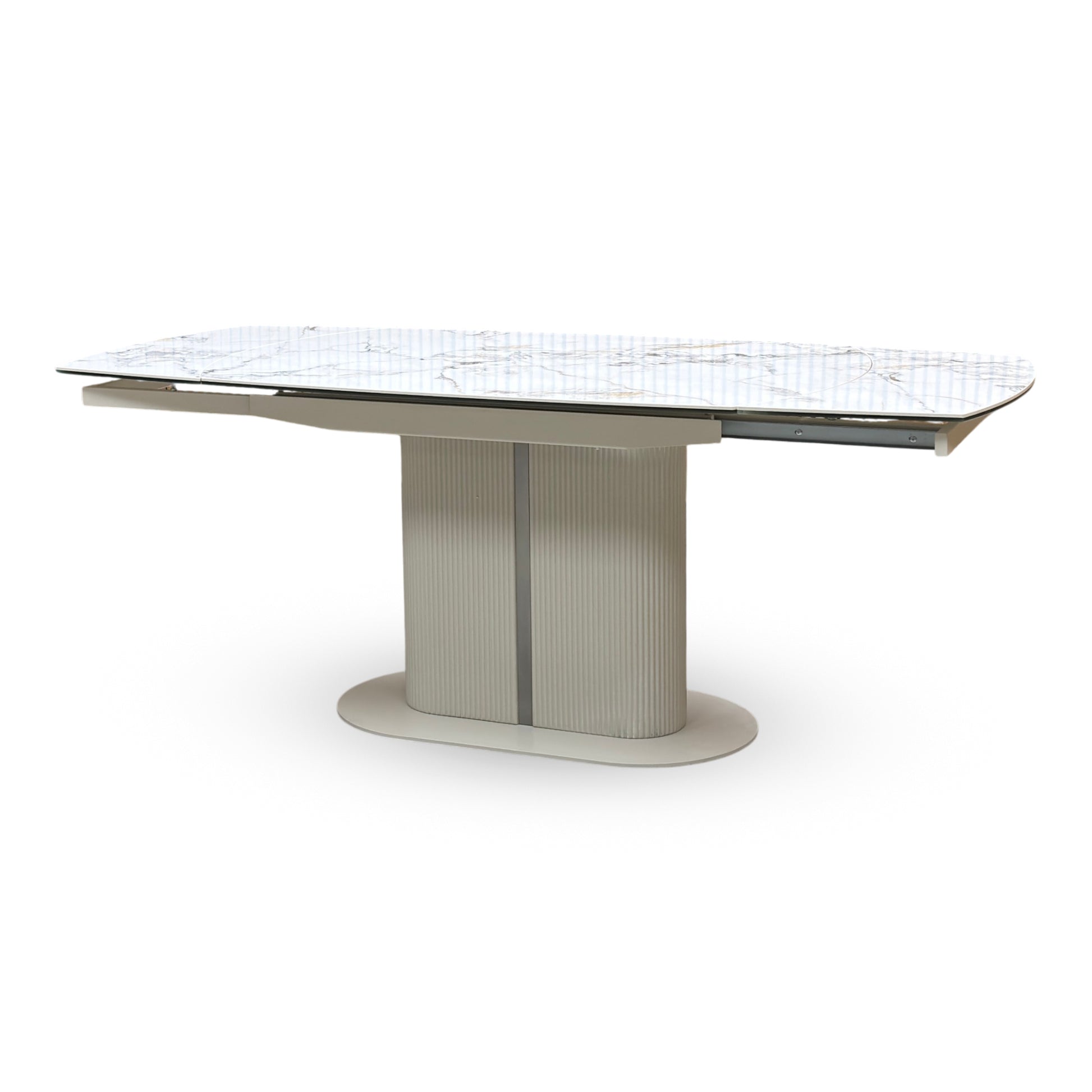 Side view of the modern architectural pedestal base on the Avorio ceramic dining table. Highlights the heavy-duty fluted or ribbed column support frame and the sleek matching floor-anchoring base plate.