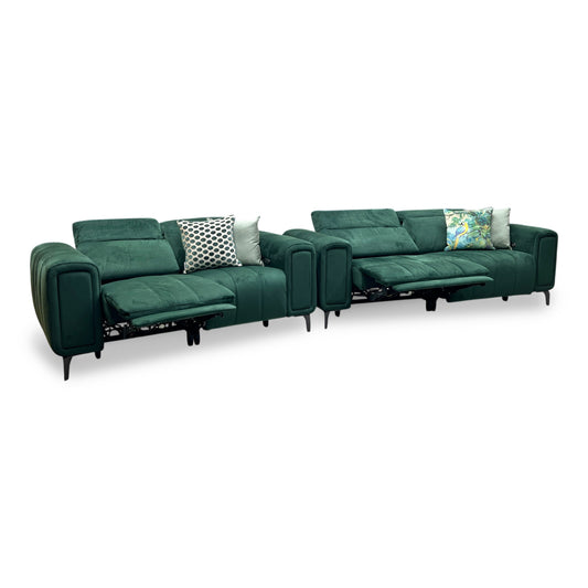 Full view of Elphaba Opulence Bottle Green fabric 3-seater and 2-seater power recliner sofa set. Premium living room suite featuring dark emerald green upholstery, Art Deco-inspired lines, pocket-sprung cushions, and hidden storage arms.