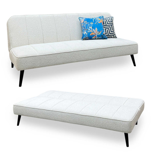 Full view ‘Courtina’ contemporary sofa bed, beautifully upholstered in a clean, minimalist natural-toned fabric with an inviting, modern silhouette.