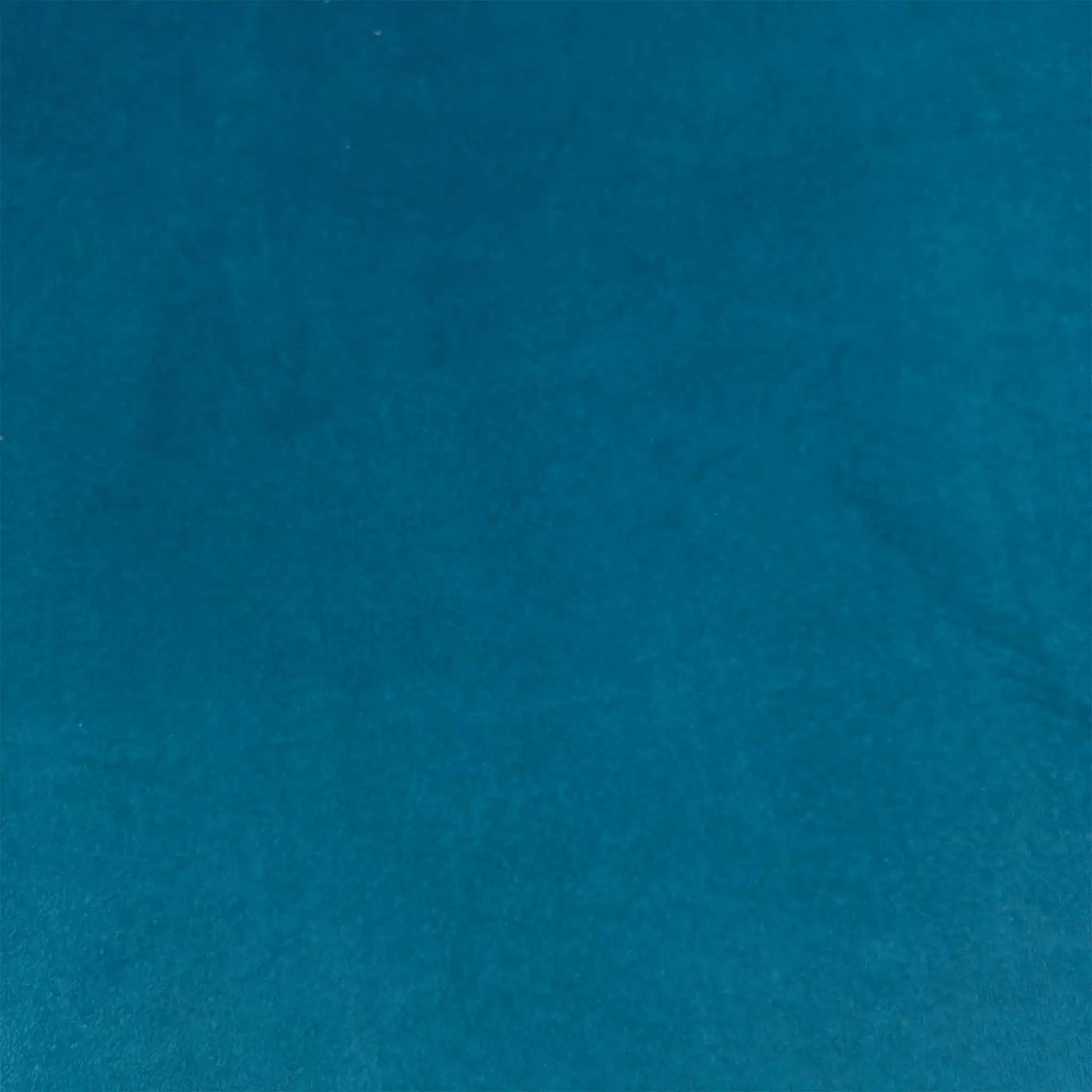 High-definition close-up macro view of the premium Dragoneye Teal upholstery fabric, detailing the rich textured woven pattern, soft-touch finish, and deep, vibrant jewel-toned teal depth.