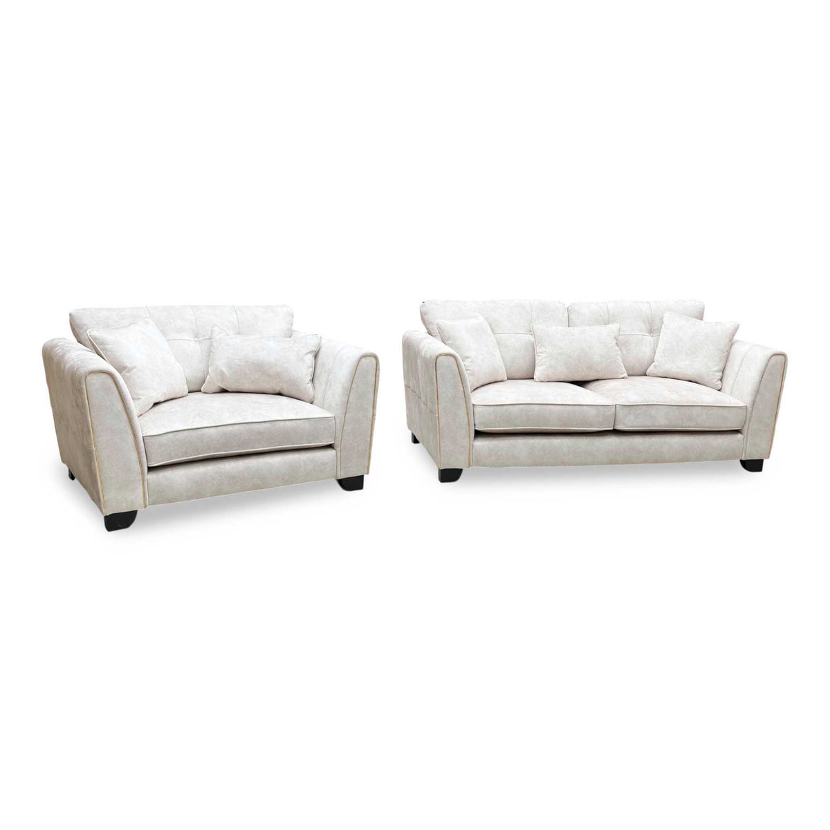Mariah Dapple ivory fabric 3 seater sofa and snuggler chair set, angled from the right with scatter cushions