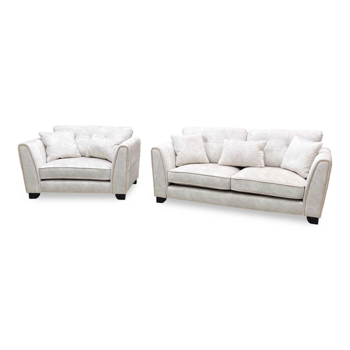 Mariah Dapple ivory fabric 3 seater sofa and snuggler chair angled from the left, showing the piped flared arms