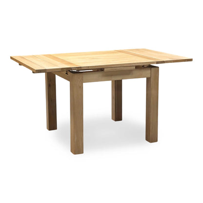 Furnitureland 'Augusta' Solid Oak Draw Leaf Extending Dining table with ‘Augusta’ Grey Cowboy Upholstered Dining Chair - Set of 4 Furniture Village