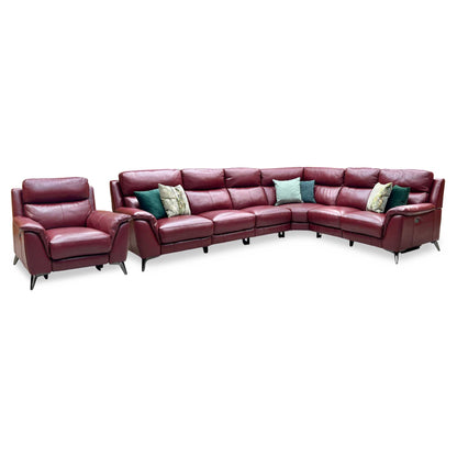 Front-facing individual studio view of the XL modular corner sofa configuration in its stationary position, showcasing its expansive L-shaped footprint, deep multi-seat cushioning, and rich deep-red leather finish.