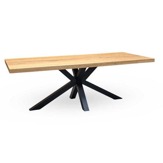 Full View ‘Bodahl Terra’ industrial-style large dining table, featuring a sleek solid European oak straight-top table in an oiled finish, supported by a heavy-duty black metal star leg base.