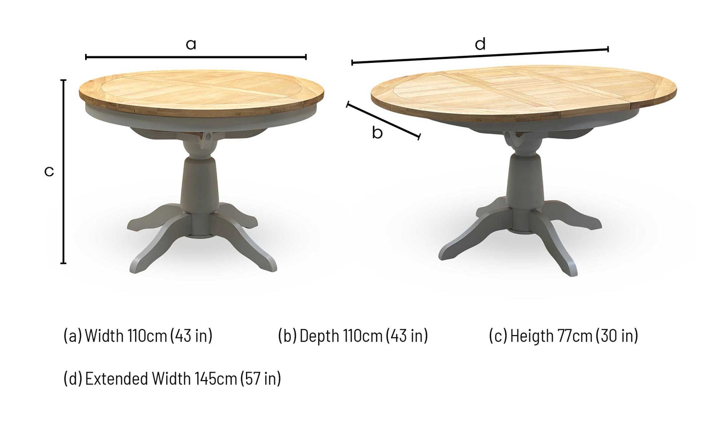 ‘Lewis’ Natural Oak Round Pedestal Butterfly Extending Dining Table with Mist Grey Fabric Button Back Dining Chairs - Set of 4 Furniture Village