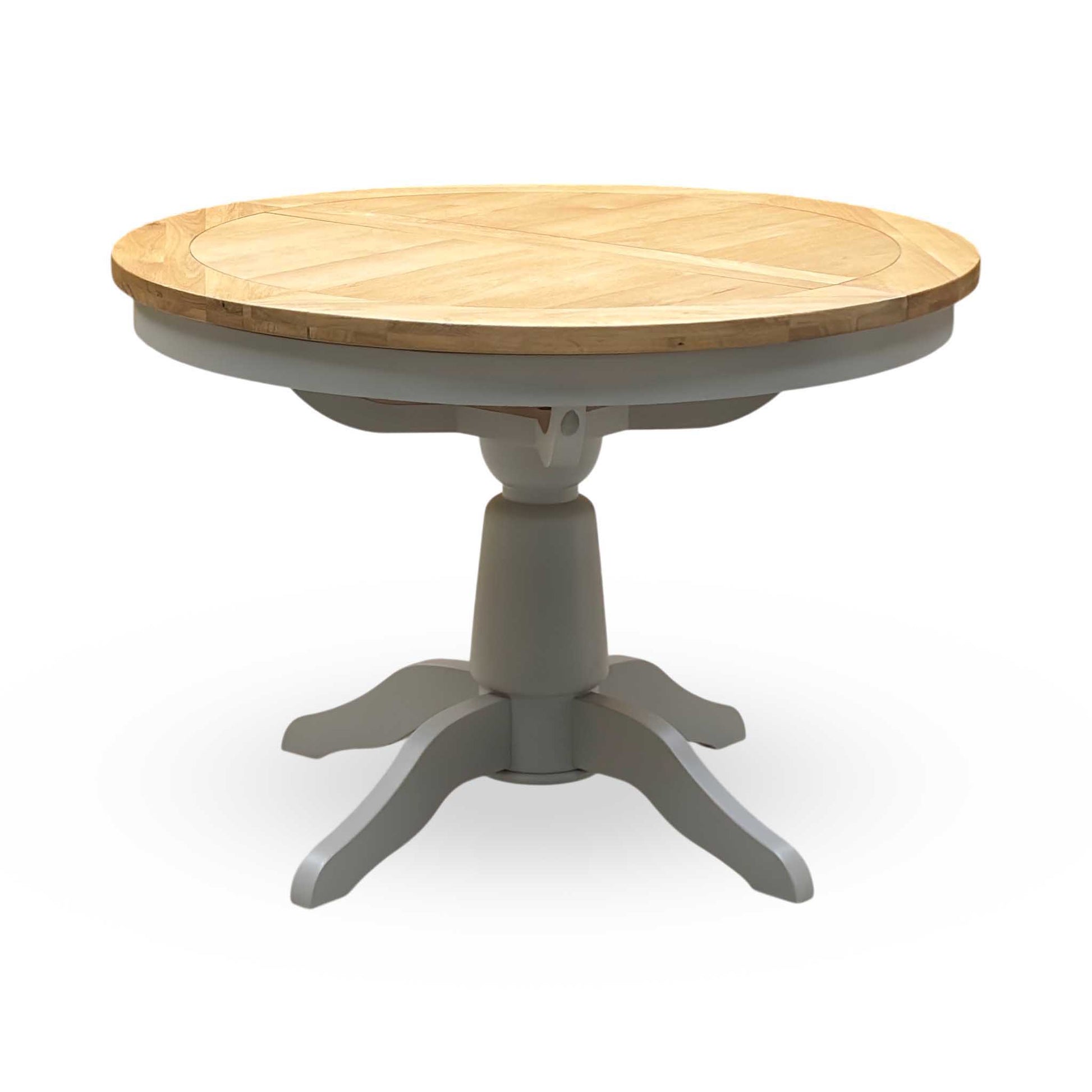 ‘Lewis’ Natural Oak Round Pedestal Butterfly Extending Dining Table with Mist Grey Fabric Button Back Dining Chairs - Set of 4 Furniture Village