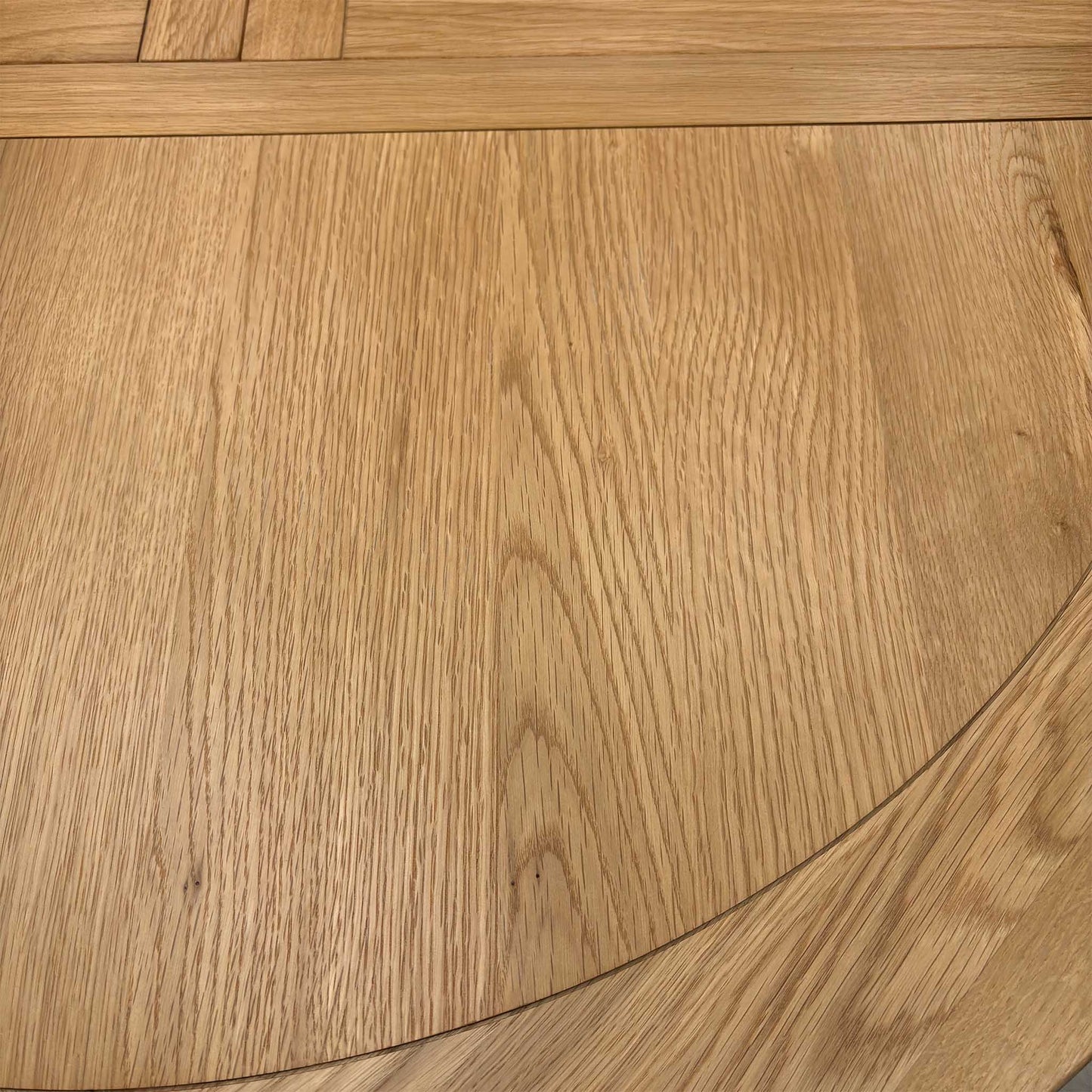 ‘Lewis’ Natural Oak Round Pedestal Butterfly Extending Dining Table with Mist Grey Fabric Button Back Dining Chairs - Set of 4 Furniture Village