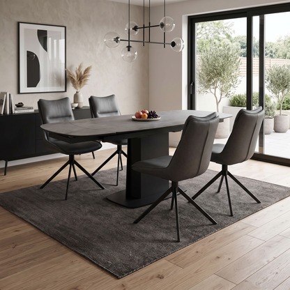 ‘Catalina’ Grey Ceramic Small Extending Dining Table with Dark Grey Faux Leather Set of 4 Swivel Dining Chairs Furniture Village