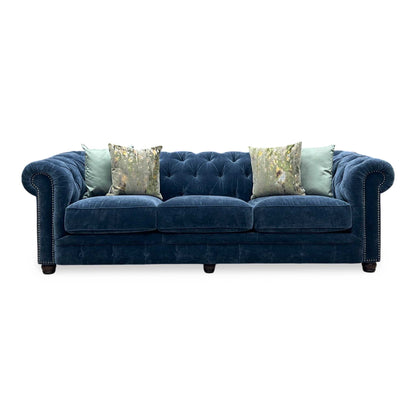 At The Helm ‘Shackleton’ X3y2-W024 Midnight Blue Fabric 4 Seater Chesterfield Sofa Furniture Village