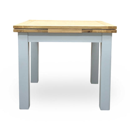 ‘Hamilton’ Solid American Oak Draw Leaf Extending Dining Table with Charcoal Grey Fabric Dining Chairs - Set of 4 Furniture Village
