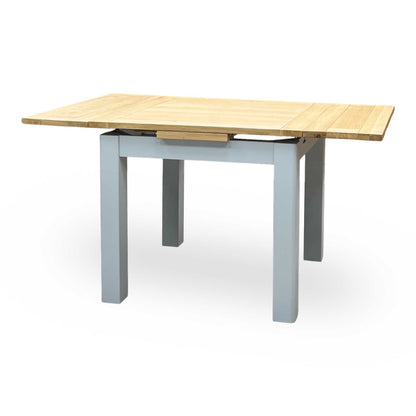 ‘Hamilton’ Solid American Oak Draw Leaf Extending Dining Table with Charcoal Grey Fabric Dining Chairs - Set of 4 Furniture Village