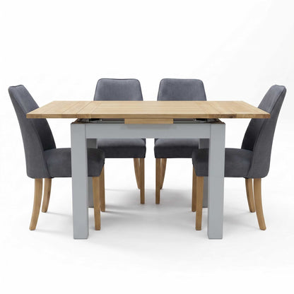 ‘Hamilton’ Solid American Oak Draw Leaf Extending Dining Table with Charcoal Grey Fabric Dining Chairs - Set of 4 Furniture Village