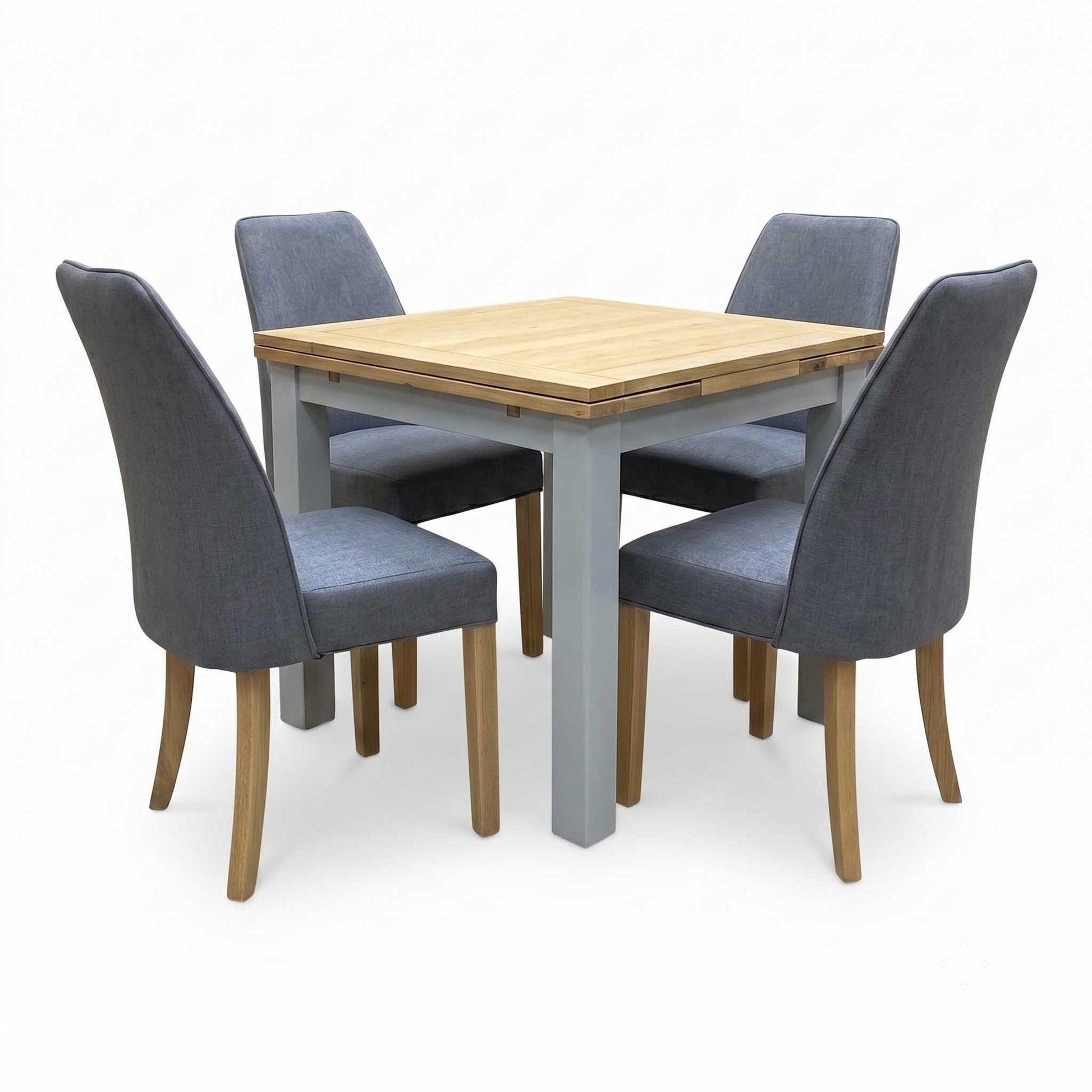 ‘Hamilton’ Solid American Oak Draw Leaf Extending Dining Table with Charcoal Grey Fabric Dining Chairs - Set of 4 Furniture Village